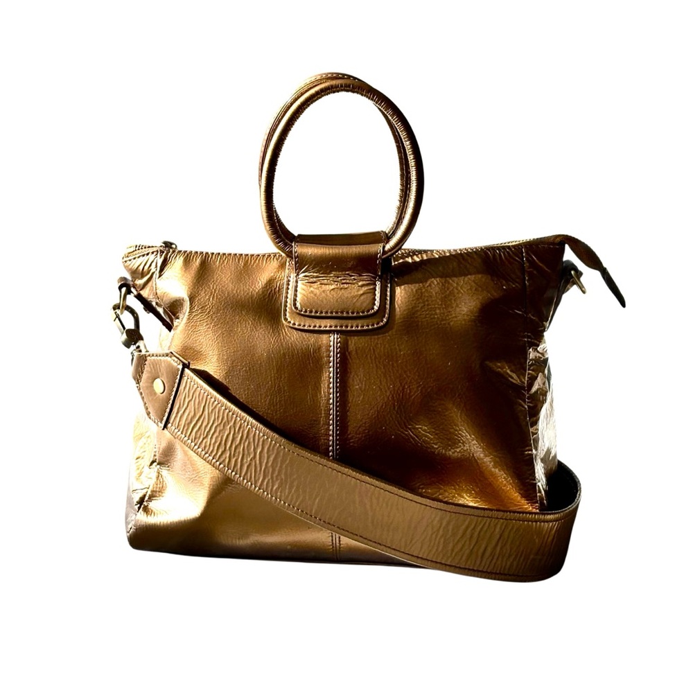 HOBO Sheila Medium Shoulder Bag in Gold Metallic with Guitar Strap